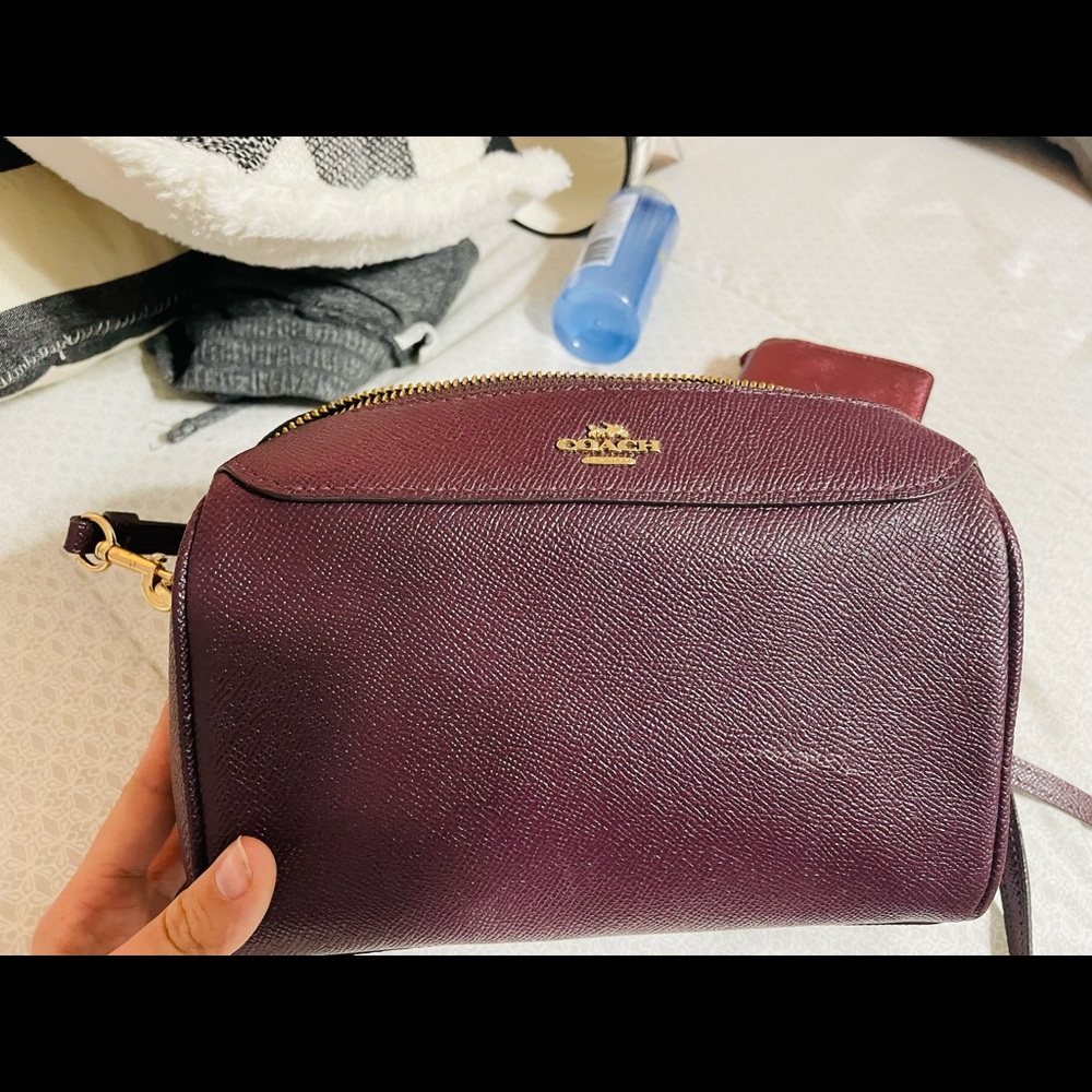 Maroon Coach crossbody purse and matching wallet